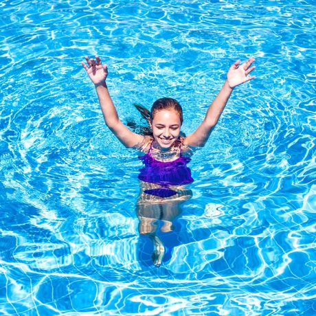 girl swimming in pool